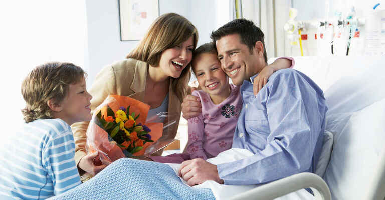 Familie am Krankenbett